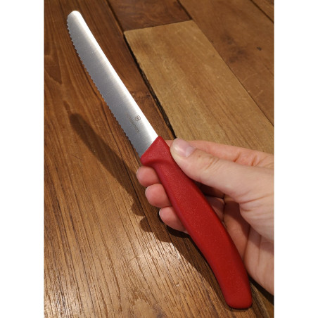 Coltello da tavola seghettato Victorinox rosso punta tonda